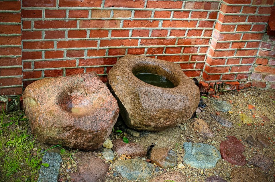 Stone with bowl-shaped hollow in the Kuldīga County Museum